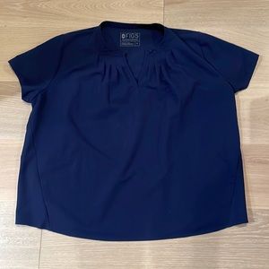 Navy blue figs maternity scrub top.